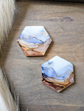 Load image into Gallery viewer, Blue and rust orange alcohol ink coasters
