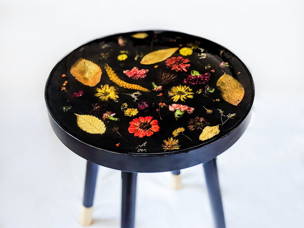 Black flower cast table