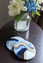 Load image into Gallery viewer, Blue, gold and white marbled coasters
