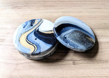 Load image into Gallery viewer, Blue, gold and white marbled coasters
