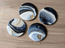 Load image into Gallery viewer, Blue, gold and white marbled coasters
