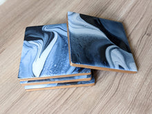 Load image into Gallery viewer, White and blue marbled coasters
