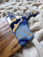 Load image into Gallery viewer, Royal blue, baby blue, and gold marbled charcuterie board
