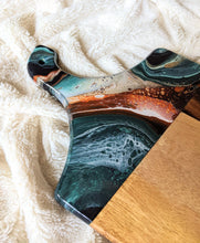 Load image into Gallery viewer, Dark teal, white, copper, and gold marbled charcuterie board
