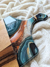 Load image into Gallery viewer, Dark teal, white, copper, and gold marbled charcuterie board
