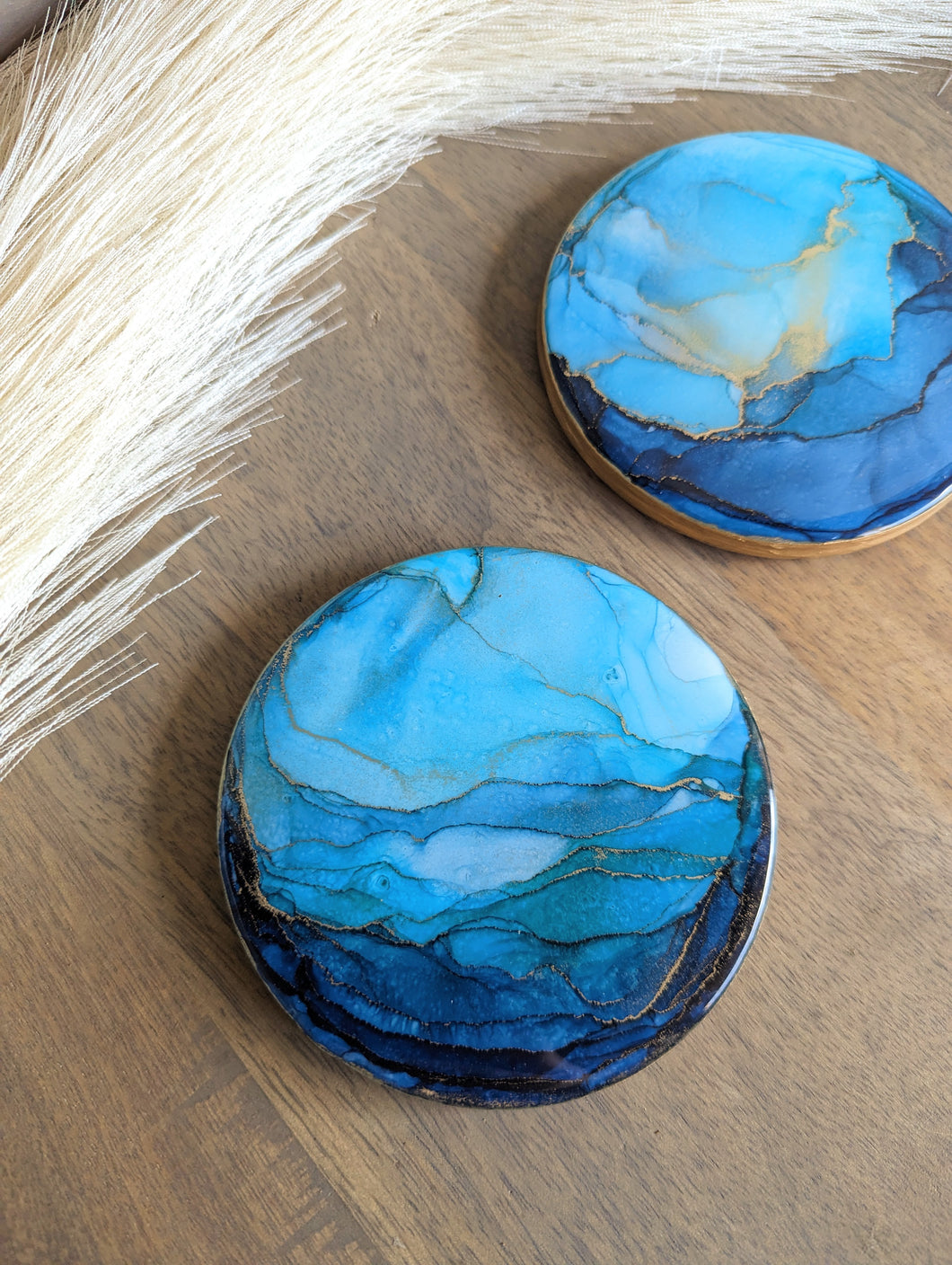 Shades of blue alcohol ink coasters