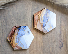 Load image into Gallery viewer, Blue and rust orange alcohol ink coasters
