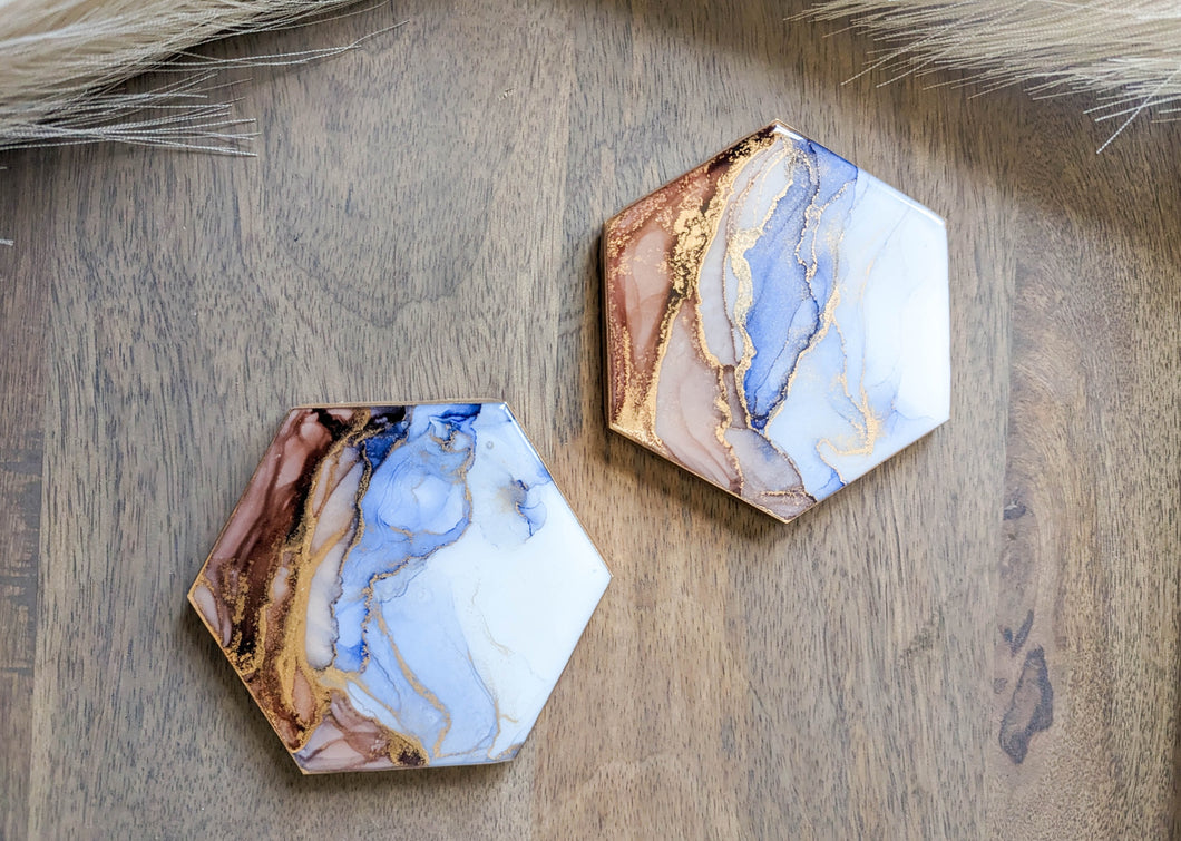 Blue and rust orange alcohol ink coasters